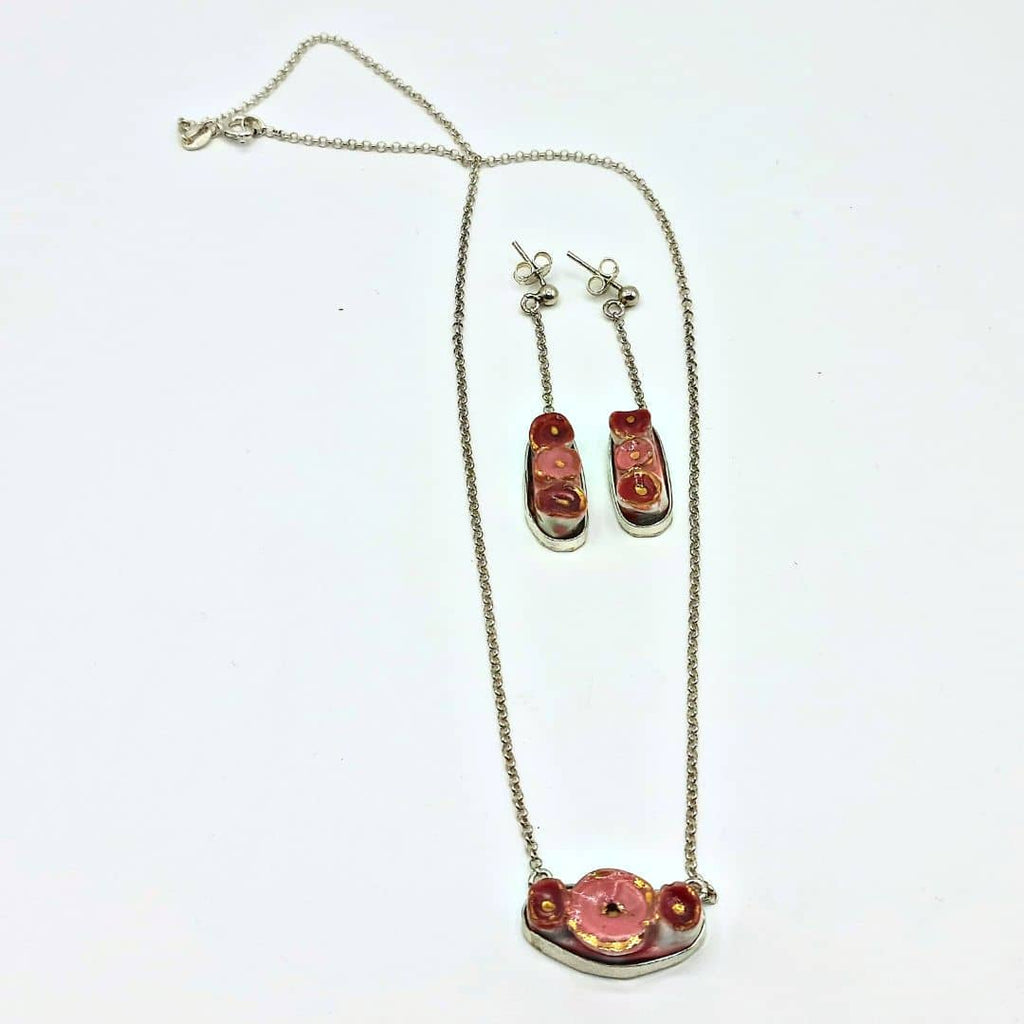 Conjunto "Las Rosas" coral largos.