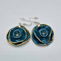 Pendientes de porcelana con filo en oro "Colección Clavel"